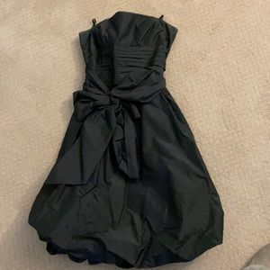 BCBG black dress with bubble hem and melted waist